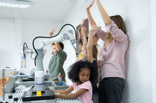 A group of students in a STEM classroom