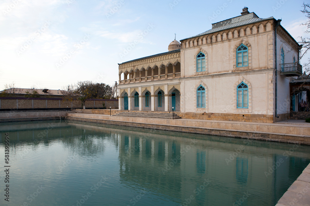 The building of the harem on the shore of the pond. Sitorai-Mohi-Khosa Palace, the country residence of the Emir of Bukhara. Bukhara. Uzbekistan