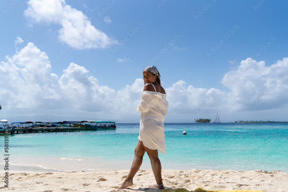 Beautiful tan Colombian women on Caribbean Beach in San Blas Tropical Islands, Panama Beautiful tan Colombian women on Caribbean Beach in San Blas Tropical Islands, Panama