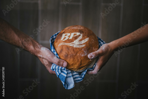 hands with a bread