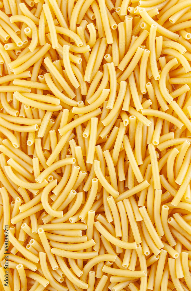 Background witn uncooked italian maccheroni pasta