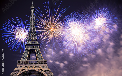 Celebratory colorful fireworks over the Eiffel Tower in Paris, France