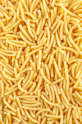 Obraz na płótnie Background witn uncooked italian maccheroni pasta w salonie