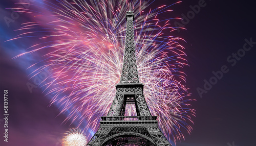 Celebratory colorful fireworks over the Eiffel Tower in Paris, France © Владимир Журавлёв
