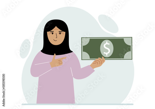A arab woman holds a large paper bill in his hand. The concept of income, expense, earning or spending money.