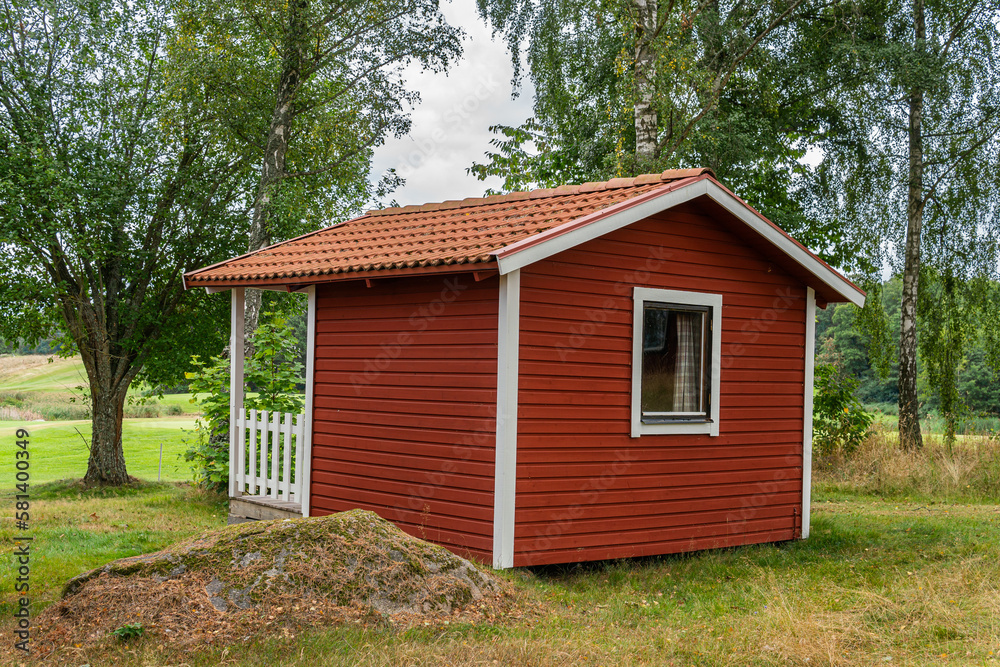 Tiny little red wooden houses in Scandinavian Swedish style near a golf course. Vintage, cozy housing. Ideal place for introverts. 