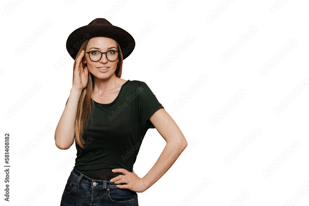 Hipster redhead young woman in glasses, casual dark green t-shirt and hat with brim, looks confident, posing over transparent background with copy space. Vogue and shopping concept.. Hipster redhead young woman in glasses, casual dark green t-shirt and hat with brim, looks confident, posing over transparent background with copy space. Vogue and shopping concept..