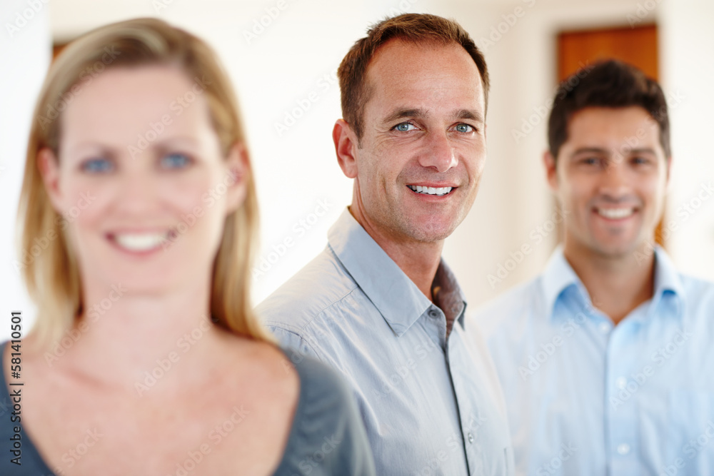Beauty and the beasts. three office workers smiling and looking at the camera. Beauty and the beasts. three office workers smiling and looking at the camera.