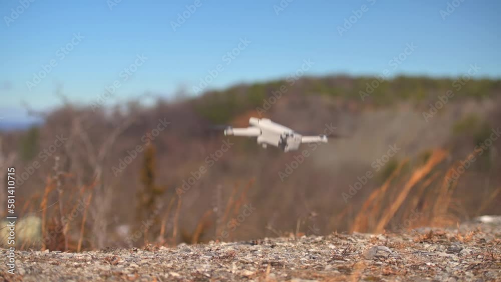 Drone startup and takeoff from mountain top. Drone startup and takeoff from mountain top.