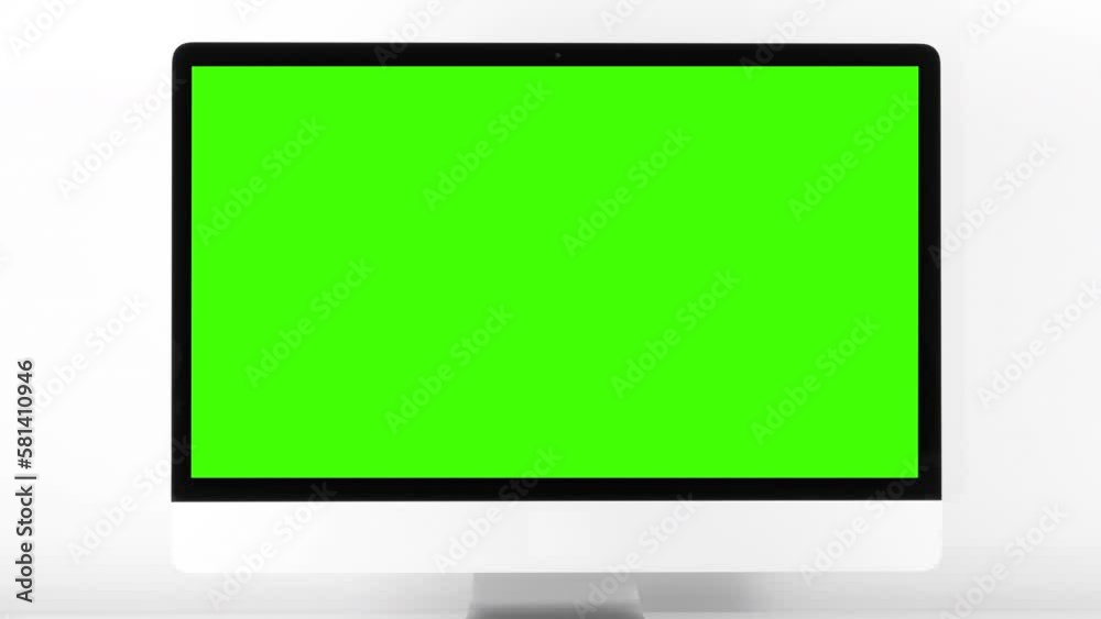 Desktop Computer Green Screen Zoom In. Zoom into the center of a green