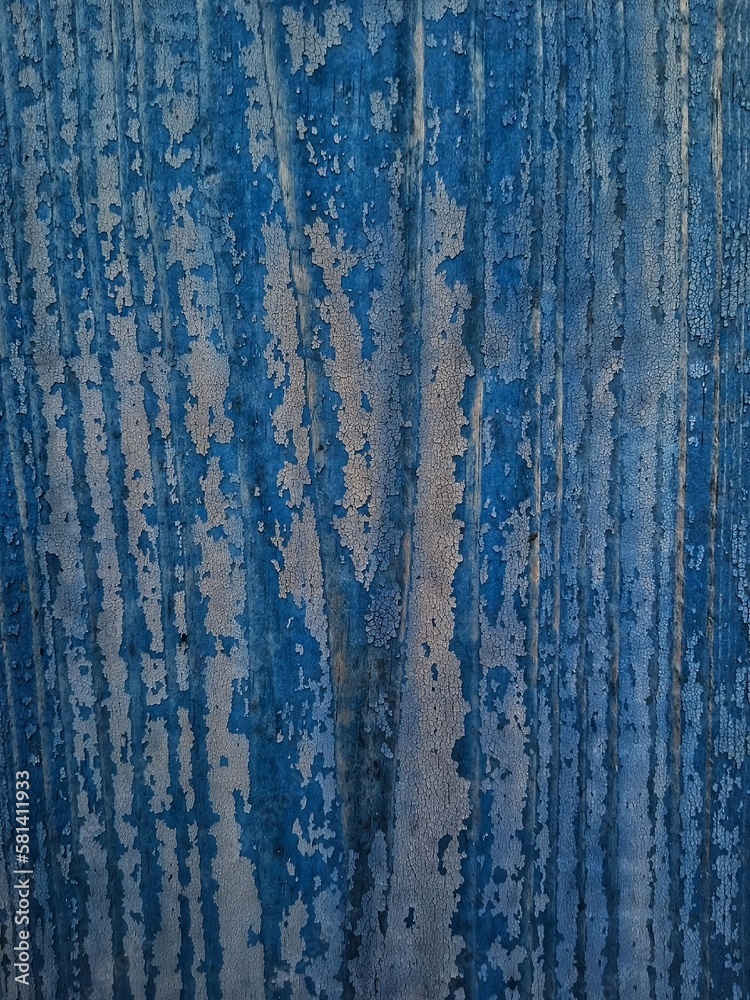 Blue dried paint on a wooden board. blue texture Blue dried paint on a wooden board. blue texture