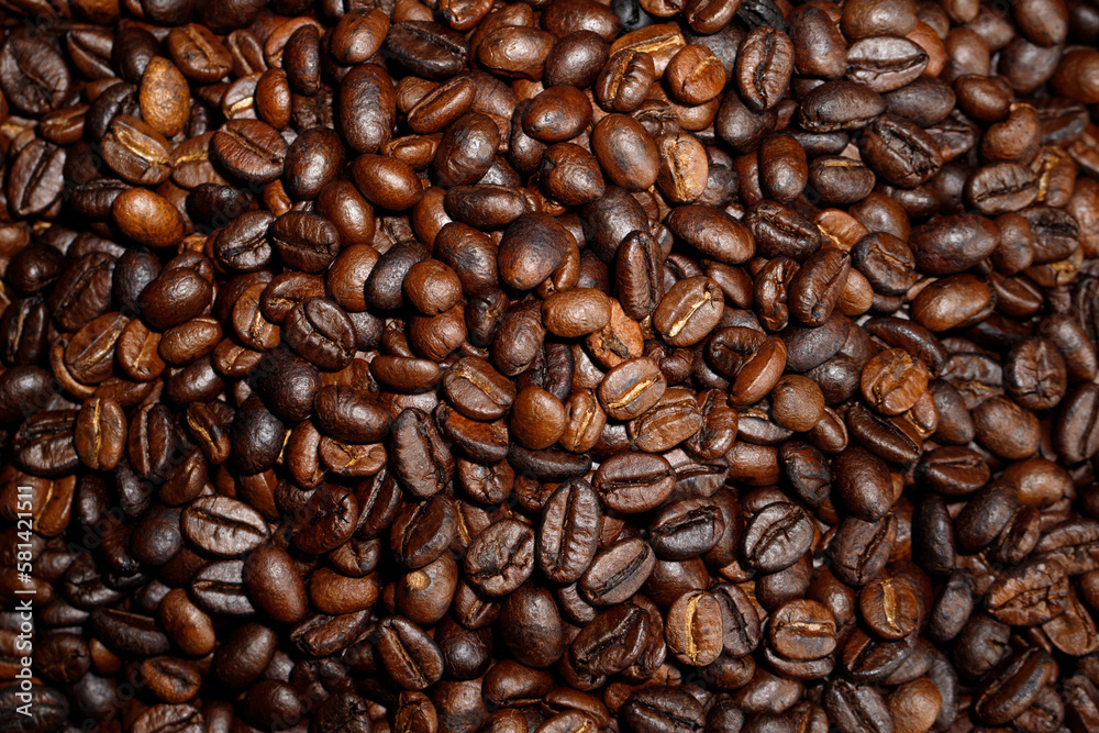 photo macro close up texture of roasted coffee beans dark, can be used as a background.. photo macro close up texture of roasted coffee beans dark, can be used as a background..