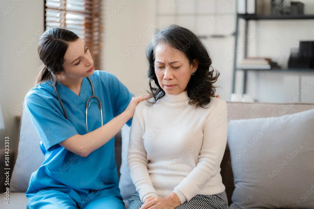 Female doctor touching patient's shoulder to encourage treatment. Female doctor touching patient's shoulder to encourage treatment.