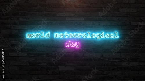 World meteorological day with neon text animation effect in wall background. Seamless loop video