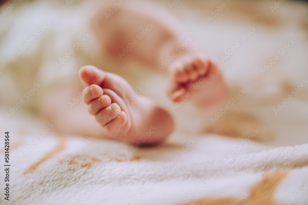 baby feet in bed