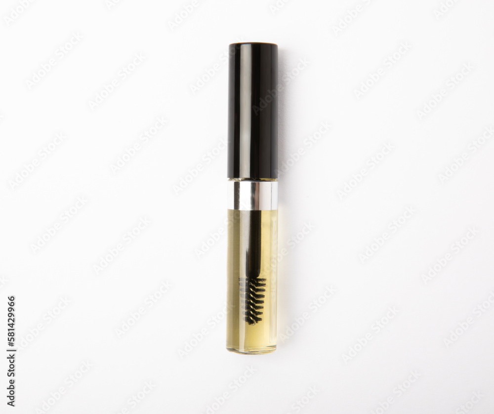 Essential oils of eyelash growth serum essence isolated on white background. Gel-serum for eyelashes. Beauty concept. Essential oils of eyelash growth serum essence isolated on white background. Gel-serum for eyelashes. Beauty concept.