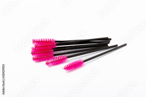 Mascara brushes isolated on white background. Makeup brushes makeup kits.Disposable brush for eyelashes and eyebrows.Close-up.