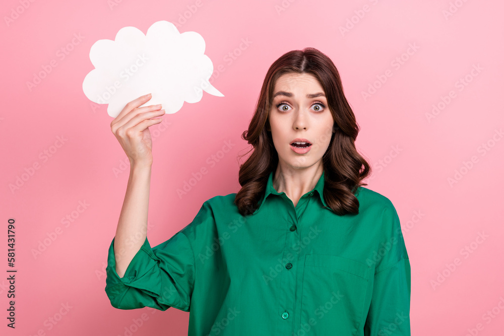Photo of impressed astonished speechless woman with wavy hairdo dressed green shirt hold mind cloud staring isolated on pink background - obrazy, fototapety, plakaty 