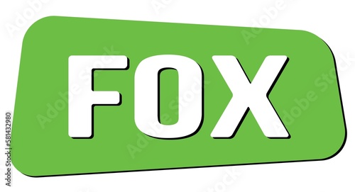 FOX text on green trapeze stamp sign.