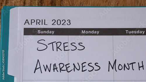 Stress Awareness Month written on a calendar in April 2023. April is National Stress Awareness Month to raise awareness of the negative impact of stress.  
