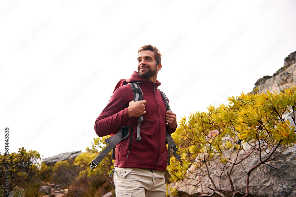 He loves to hike. a young man enjoying a hike through the mountains. He loves to hike. a young man enjoying a hike through the mountains.