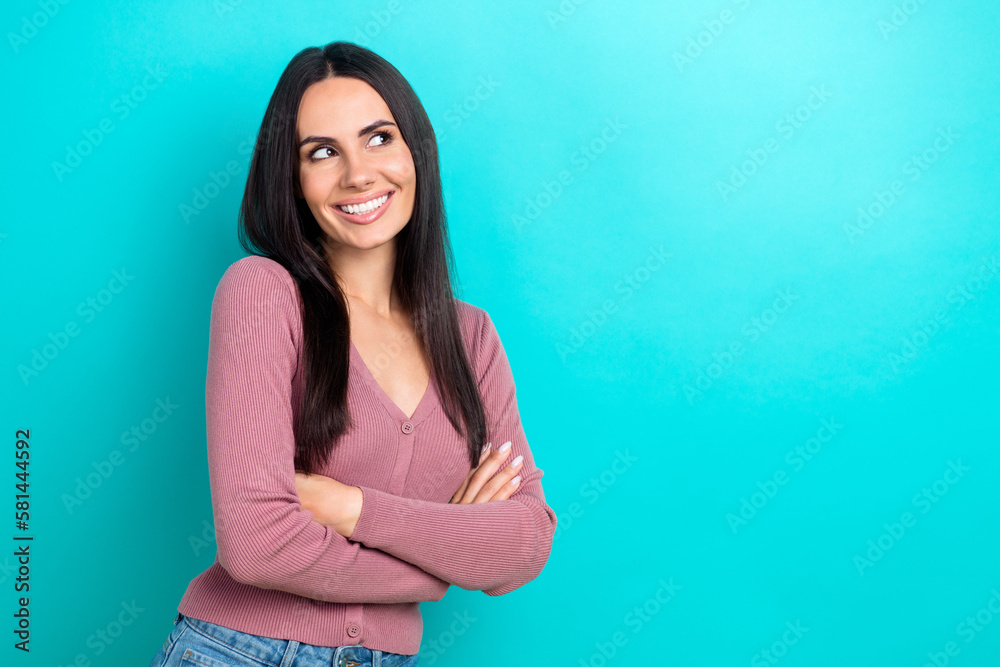 Portrait of positive woman long hairstyle wear pastel clothes look empty space arms folded isolated on shine turquoise color background Portrait of positive woman long hairstyle wear pastel clothes look empty space arms folded isolated on shine turquoise color background