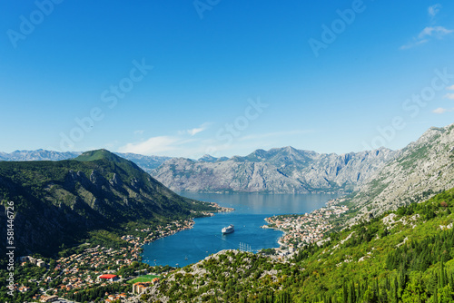 Top view of the Bay of Kotor in which there is a huge tourist liner. Postcard view