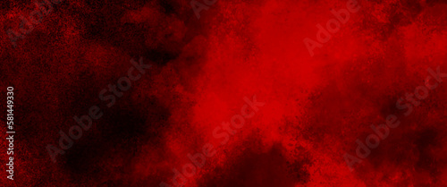 abstract red powder explosion on black background. abstract red powder splatted on black background. Freeze motion of red powder exploding.