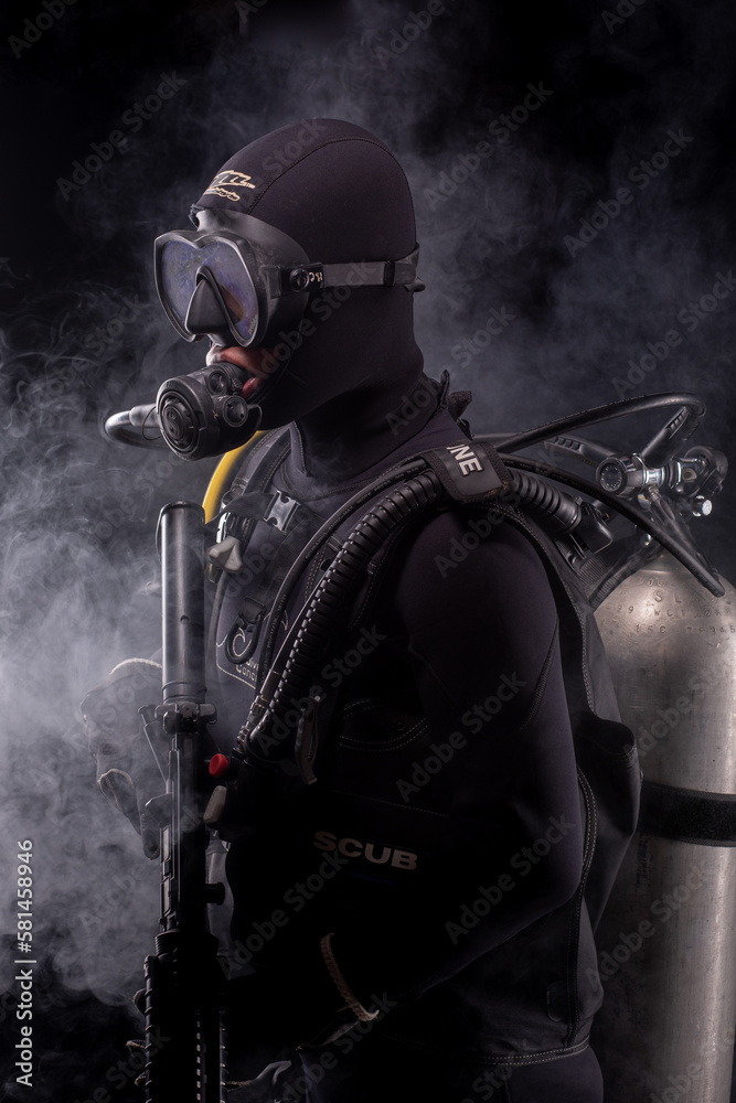 Spec ops police officer SWAT special forces with a weapon in his hands ...
