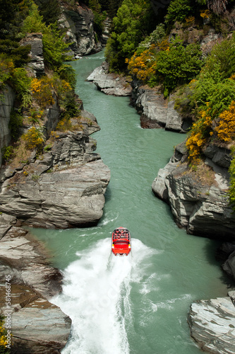 High-speed jet boat ride on Queenstown's Shotover river in Queenstown, New Zealand photo