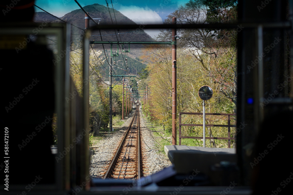 Fototapeta premium Cable car railway track view from the cable car train