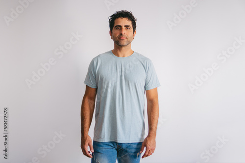 Front middle shot of a professional latin model taken on a white background.