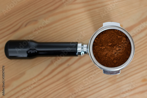 Ground coffee in portafilter photo