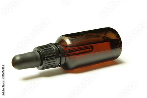 Dropper glass bottle isolated on white background. Pump pipette serum container