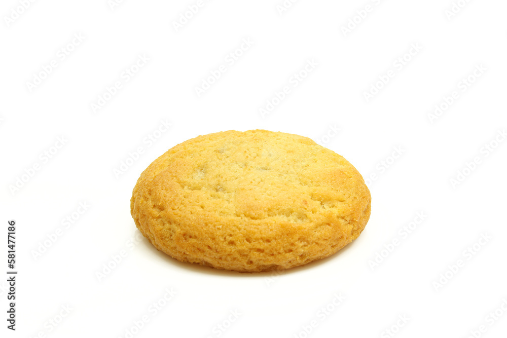 Single small golden treat cookie biscuit isolated on white background Single small golden treat cookie biscuit isolated on white background