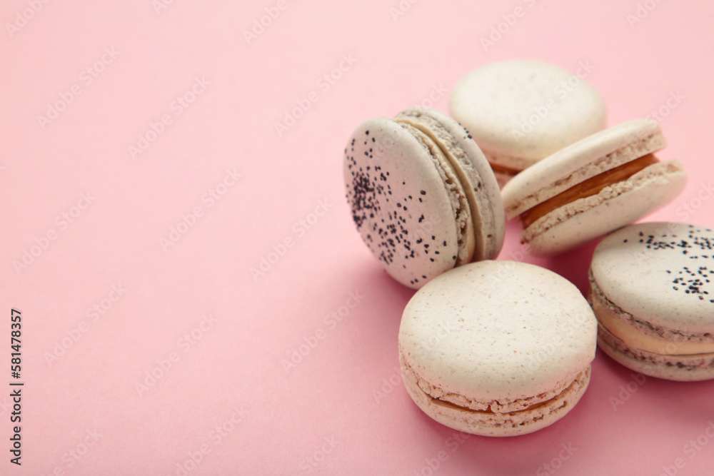 Cake macaron or macaroon on pink background. Space for text Cake macaron or macaroon on pink background. Space for text