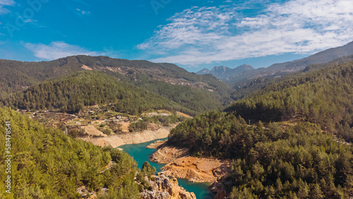Stunning bird's-eye view of the Dimchai River and mountain ranges. 