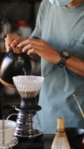 barista brewing coffee  pour over coffee