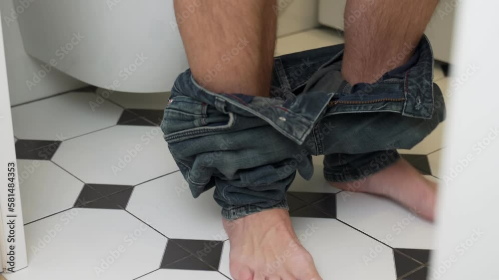 Digestive problems, diarrhea, abdominal pain in people. Men's legs with ...