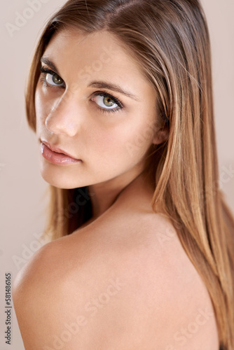 Beguiling beauty. Studio portrait of an attractive model gazing at the camera.