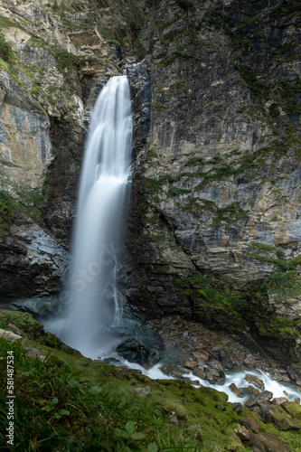 a large waterfall in a rock in the austrian alps in the hohe tauern mountains