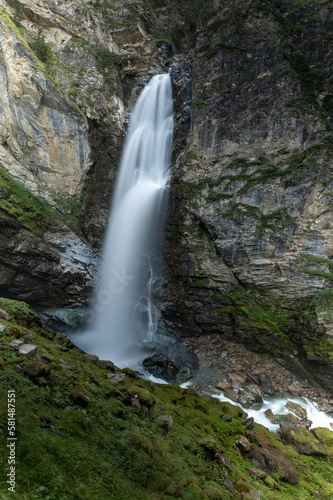 Fototapeta Naklejka Na Ścianę i Meble -  a large waterfall in a rock in the austrian alps in the hohe tauern mountains