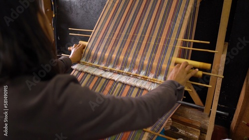 A bhutanese women waeving fabric in Thimphu, Bhutan