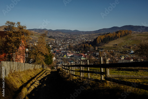 Wooden fences on the background of autumn mountains