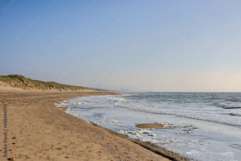 Panorama of the North Sea beach with the city of The Hague on the horizon. Wassenaar, The Netherlands. Panorama of the North Sea beach with the city of The Hague on the horizon. Wassenaar, The Netherlands.