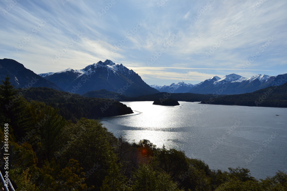 lake in the mountains, sunset, patagonia with snow
