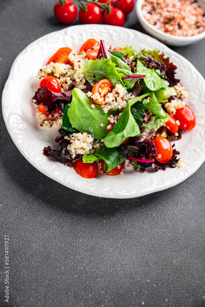 quinoa salad tomato, green lettuce mix healthy meal food snack on the table copy space food background rustic top view keto or paleo diet veggie vegan or vegetarian food quinoa salad tomato, green lettuce mix healthy meal food snack on the table copy space food background rustic top view keto or paleo diet veggie vegan or vegetarian food