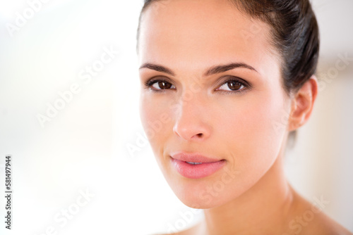 Unblemished and perfect. Headshot of a beautiful woman with flawless skin.