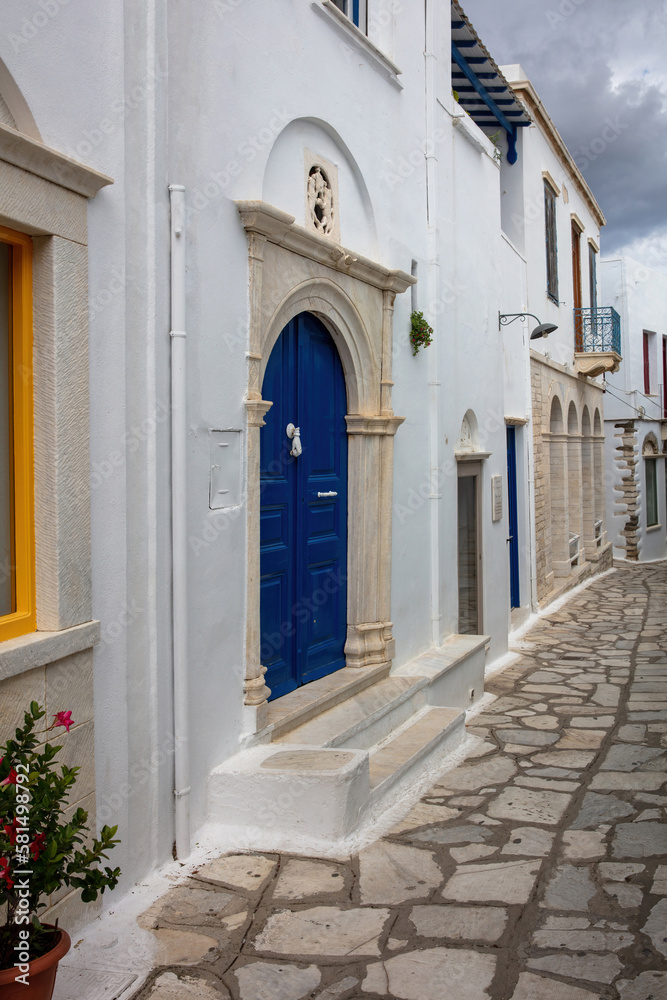 Greece. Tinos island. Cycladic architecture in white and blue at Pyrgos village.