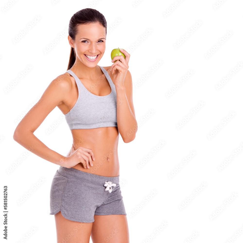 Health begins with a good diet. Studio shot of a sporty young woman holding an apple and smiling. Health begins with a good diet. Studio shot of a sporty young woman holding an apple and smiling.